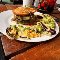 „Burger” with banana bun and fresh veggies with the most incredible two sauces   at Tostometro in Granada
