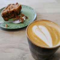 Flat white with carrot apple tea crunch at Canopy in Guildford