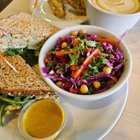Chickpea Sunflower sandwich, Thai Peanut side bowl, Vegan Apricot/White Chocolate scone, Gingerbread Mocha Oat Milk latte #Veganuary at Uptown Cafe in Valparaiso