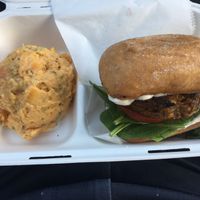 Lentil burger with a side of sweet potato salad  at With Love Co in Parkville