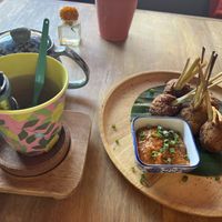 Lao green tea and fried vegetables with lemongrass   at Bouang  in Luang Prabang