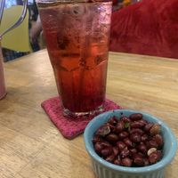 Italian grenadine soda and nuts  at Bouang  in Luang Prabang