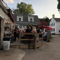 Bar and outdoor seating in back at La Orilla in Ogunquit