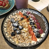 Vegan Soy yoghurt bowl with fruit and granola for 7,50€. Was really delicious! at Nana in Heidelberg