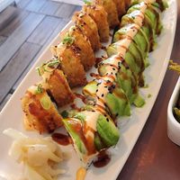 we swapped crab and salmon for veggies ♥️ be aware of the topping sauces if you dont consume dairy though! at Tanuki in Kyiv