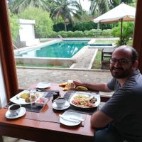 Breakfast by the pool at Jaffna Heritage Hotel in Jaffna