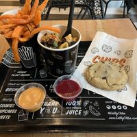 Yum, yum, YUM! Mac n’ cheese, sweet potato fries, chocolate chip cookie (and amazing sauces). at By Chloe - Oxford Circus in London