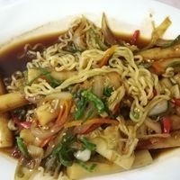 The vegan Rabokki including ramen, vegetables, soy sauce and thick rice pasta (masa the arroz) was awesome! at Banchan Nara in Recoleta