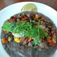 Vegan taco with beans and salsa and avocado sauce and some other ingredients  at Hanoi Taco Bar in Hanoi