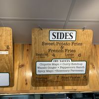 Sides menu (curry ketchup fry sauce was vegan and delicious!) at Wieners of Waterton in Waterton Park