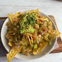 Nachos with guacamole, pico de gallo and jalapeños  at Surf House in Barcelona