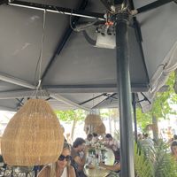 Outside seating next to the beach  at Surf House in Barcelona