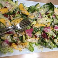 Creative and delicious mango with avocado on bibb lettuce with a horseradish dressing.   at Pyramid Bistro in Aspen