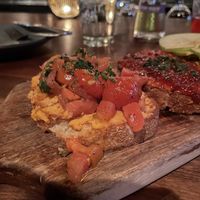 Not on the menu but available if you ask (left): vegan bruschetta (almond hummus + tomato/basil/vinaigrette)  at Postino Central in Phoenix
