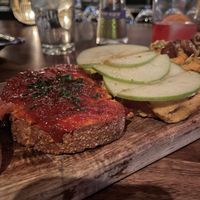 Left: Red Pepper Jam + Almond Hummus, Right: Almond Humid with Fig Jam + Green Apple  at Postino Central in Phoenix