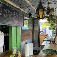 Menu and tables at Floresta Cafe in Delray Beach