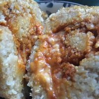 Bulgur arancino filled with soy ragù  at Leccornie in Milan