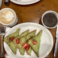 Avocado toast with a side of black beans and oat milk latte   at Aunt Chubby's in Hopewell