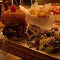 Burger with chickpea biscuit, salad and fries for 70 DH. at Corner Cafe in Marrakech
