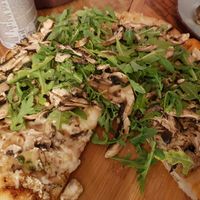 Mushroom pesto rocket pizza at Yerbamate in Conil De La Frontera