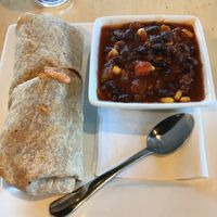 Veggie Wrap & bowl of Black Bean Chili. Great lunch combo. at Peoples Organic in Eden Prairie