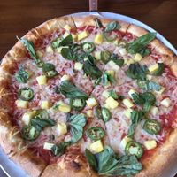 Vegan pizza: fresh jalapeños, pineapple and basil   at Pizzoco in Winchester