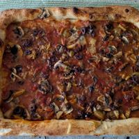 This is their large size dough to go for $6,  topped and baked at home. Highly recommend! at Pizzoco in Winchester