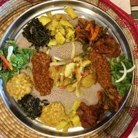 The ultimate combo with steamed potatoes added (center). So yummy!!! at Taste of Ethiopia in Pflugerville