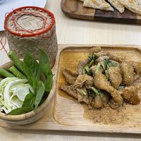 Spicy grilled veganpork and sticky rice, 99 baht (plus 7% tax)  at Bai Plu House in Bangkok