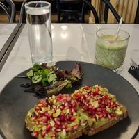 Avocado bread with pomeogranate seeds at Art Cafe Bar in Bled