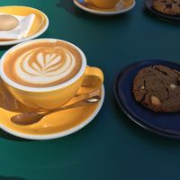 Coffee with oat milk and vegan cookie at Milkees in Lisbon