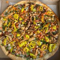 Pepper pizza with “chicken"  at Nabati Vegan Mediterranean in Oklahoma City