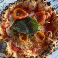 Vegan margarita pizza with tomatoes and cashew cream  at Pico Pizza - Nørrebro in Copenhagen