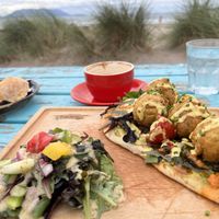 Falafel and flat white with oat milk  at Sammy's in Inch