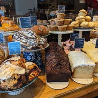 Vegan items are marked with a "V". They had two vegan scones and two vegan lemon pound cake options when we went at Purebread in Whistler