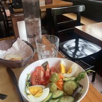 Water (carbonated or still), bread, and salad with lunch menu  at Al Vapore  in Venice