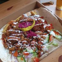Mega box: Spiced seitan doner, middle-eastern spiced soya shreds, fresh salad, za'atar spiced fries, chilli sauce, garlic sauce and pickles served on a traditional flatbread  #Vega at Seitan's Kebab in Manchester