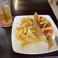 Mexican dog and peach iced tea  at Filthy Vegan in Ho Chi Minh City