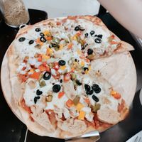 Vegan pizza, delicious homemade cheese and lots of toppings. at Filthy Vegan in Ho Chi Minh City