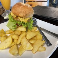Dal lentil burger with fries and cashew cheese, 160,000 VND  at Filthy Vegan in Ho Chi Minh City