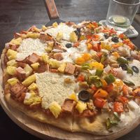 Half-and-halfed pizza, with cashew cheese at Filthy Vegan in Ho Chi Minh City