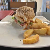Vegan bacon cheese burger, with fries  at Filthy Vegan in Ho Chi Minh City