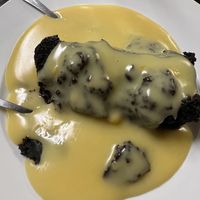 Chocolate cake and custard   at Filthy Vegan in Ho Chi Minh City