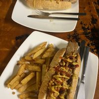 Plain hotdog and mexican hotdog with chips   at Filthy Vegan in Ho Chi Minh City
