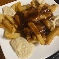 Lodes fries with gravy and cashew cheese   at Filthy Vegan in Ho Chi Minh City