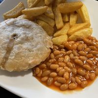 Chicken and mushroom pie with baked beans and chips + gravy on the side (not in the  picture)  at Filthy Vegan in Ho Chi Minh City