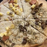 Pizza without tomato sauce - 1/2 Hawaii and 1/2 Mushroom (delicious!)  at Filthy Vegan in Ho Chi Minh City