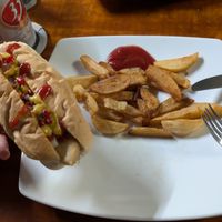 spicy dog with homemade chips at Filthy Vegan in Ho Chi Minh City