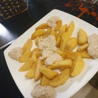 Cheesy chips 7.5/10 - soft inside almost like potato wedges with the size and thickness at Filthy Vegan in Ho Chi Minh City