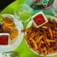 Fried chicken with home made chili fries at Green Flamingo in Innsbruck